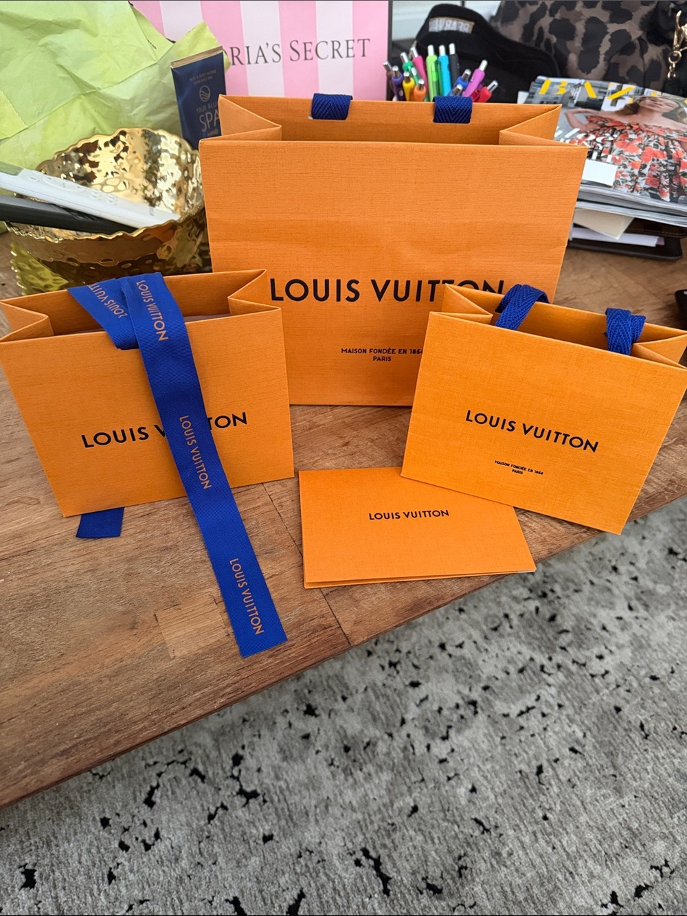 Louis Vuitton Orange Gift Bag Trio with Blue Ribbon Accents